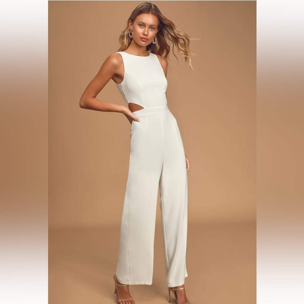 Beautiful white jumpsuit! With tags! Never worn other than a try on!